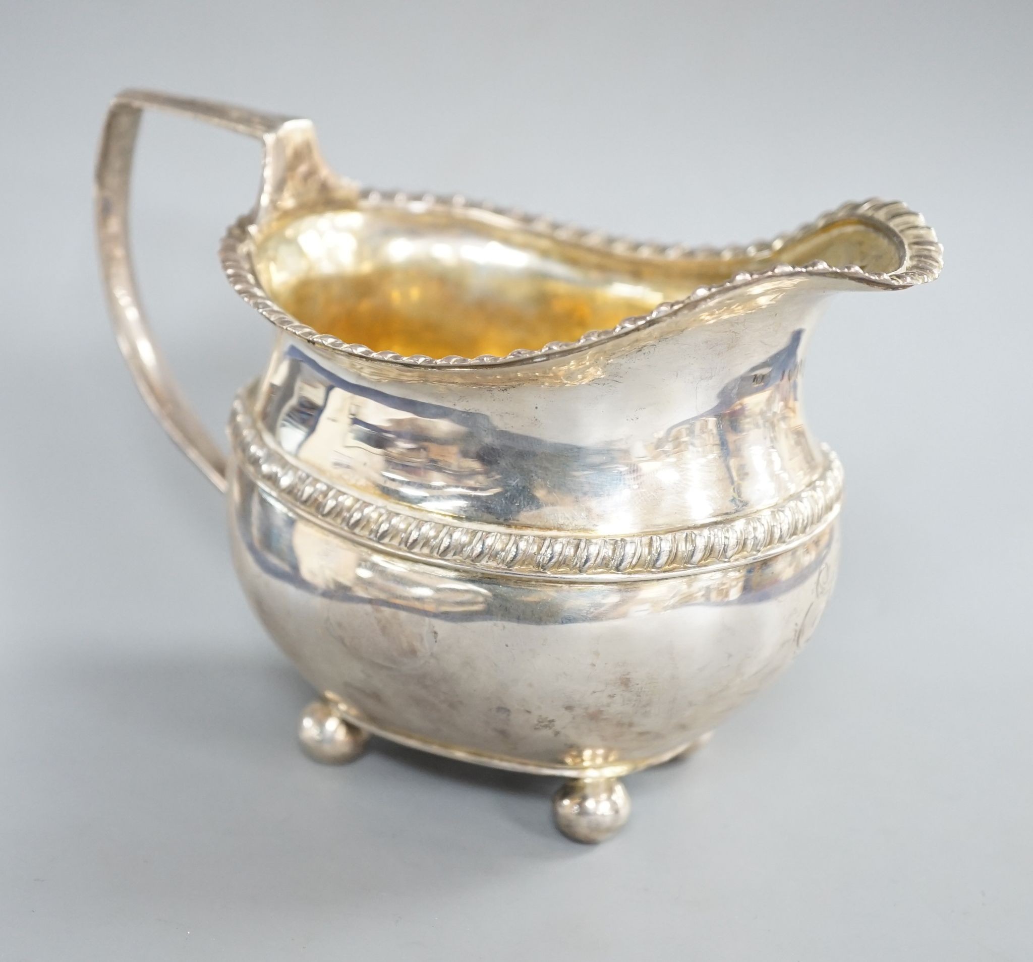 A late George III silver cream jug, J.S?, London, 1817, 10.2cm, 6.5oz.